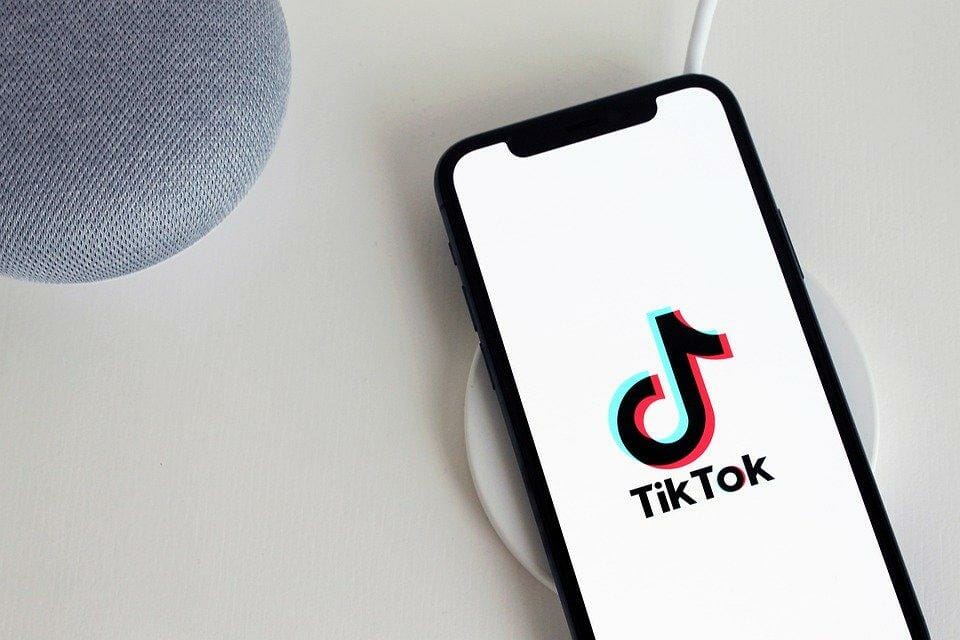 tiktok logo on smartphone screen