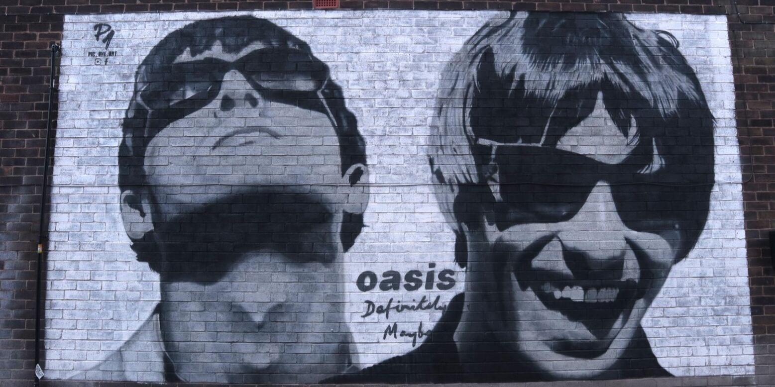 Oasis-Mural. Reunion tour begins in Cardiff