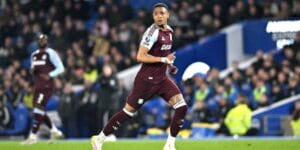 Ezri Konsa on the field during a Premier League match between Aston Villa and Brighton.