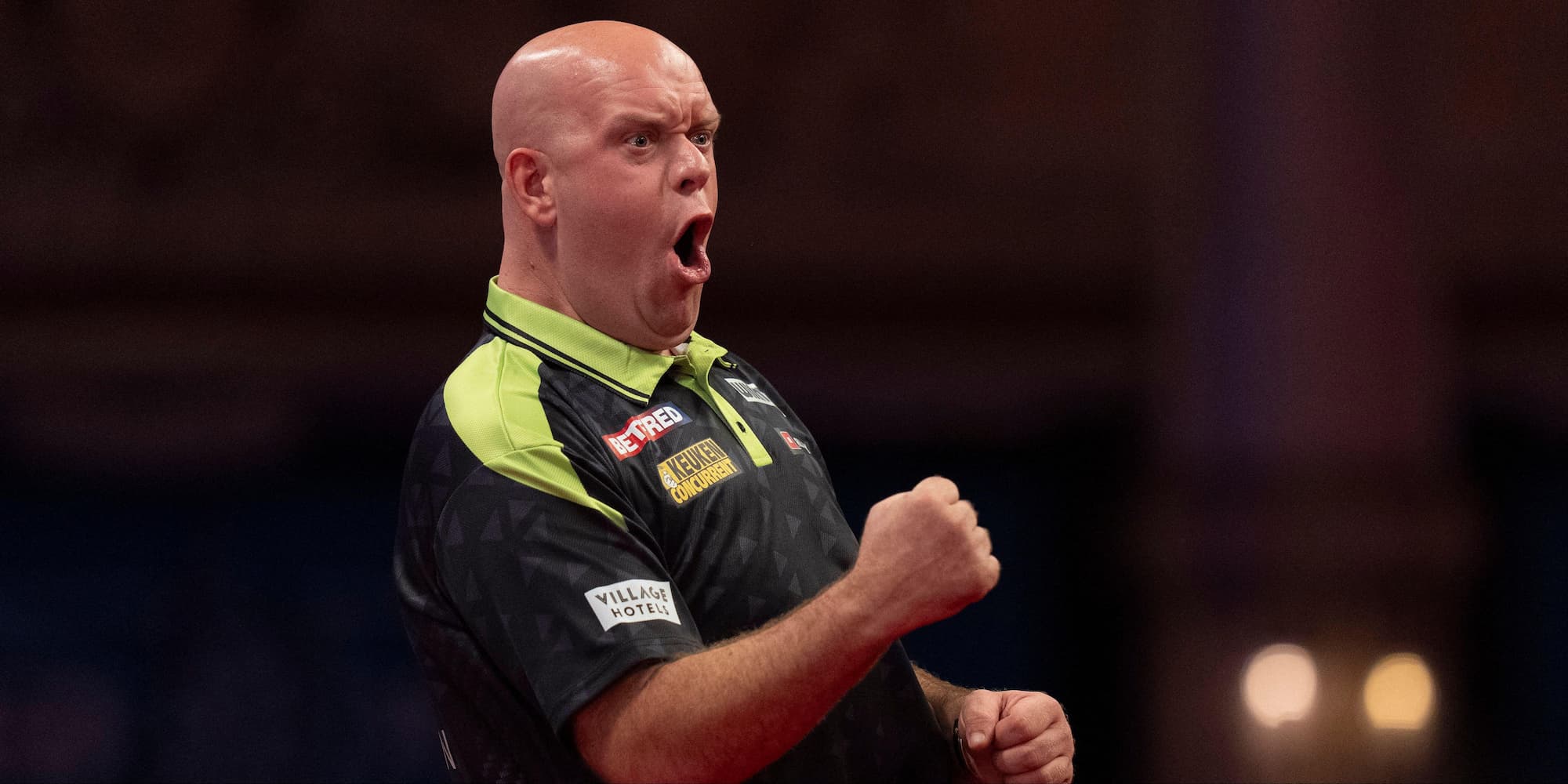 Michael van Gerwen celebrating on stage