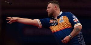 Jock Roche in Action during the 2025 Betfred World Matchplay Darts Day 3