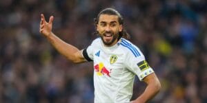 Dominic Calvert-Lewin playing for Leeds United in their white home strip