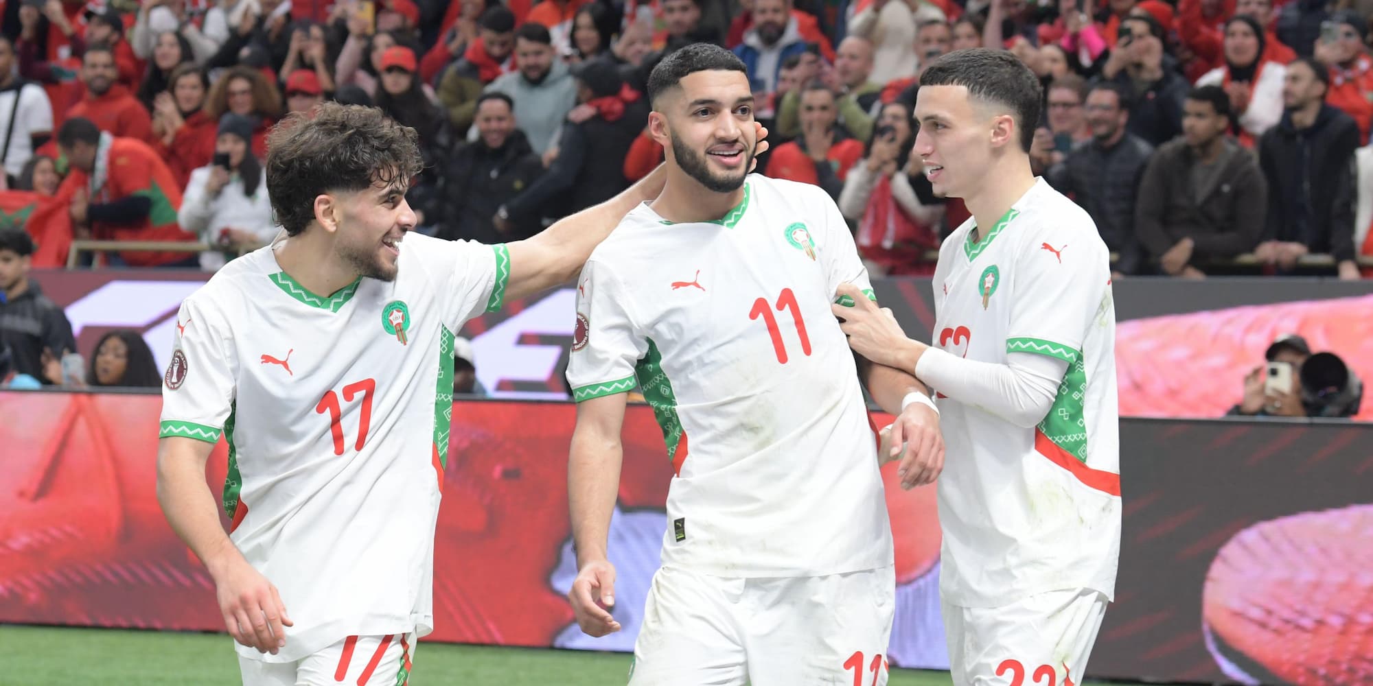 Morocco players celebrate scoring a goal in 2025-26 AFCON