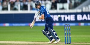 Jacob Bethell batting for England in their blue strip