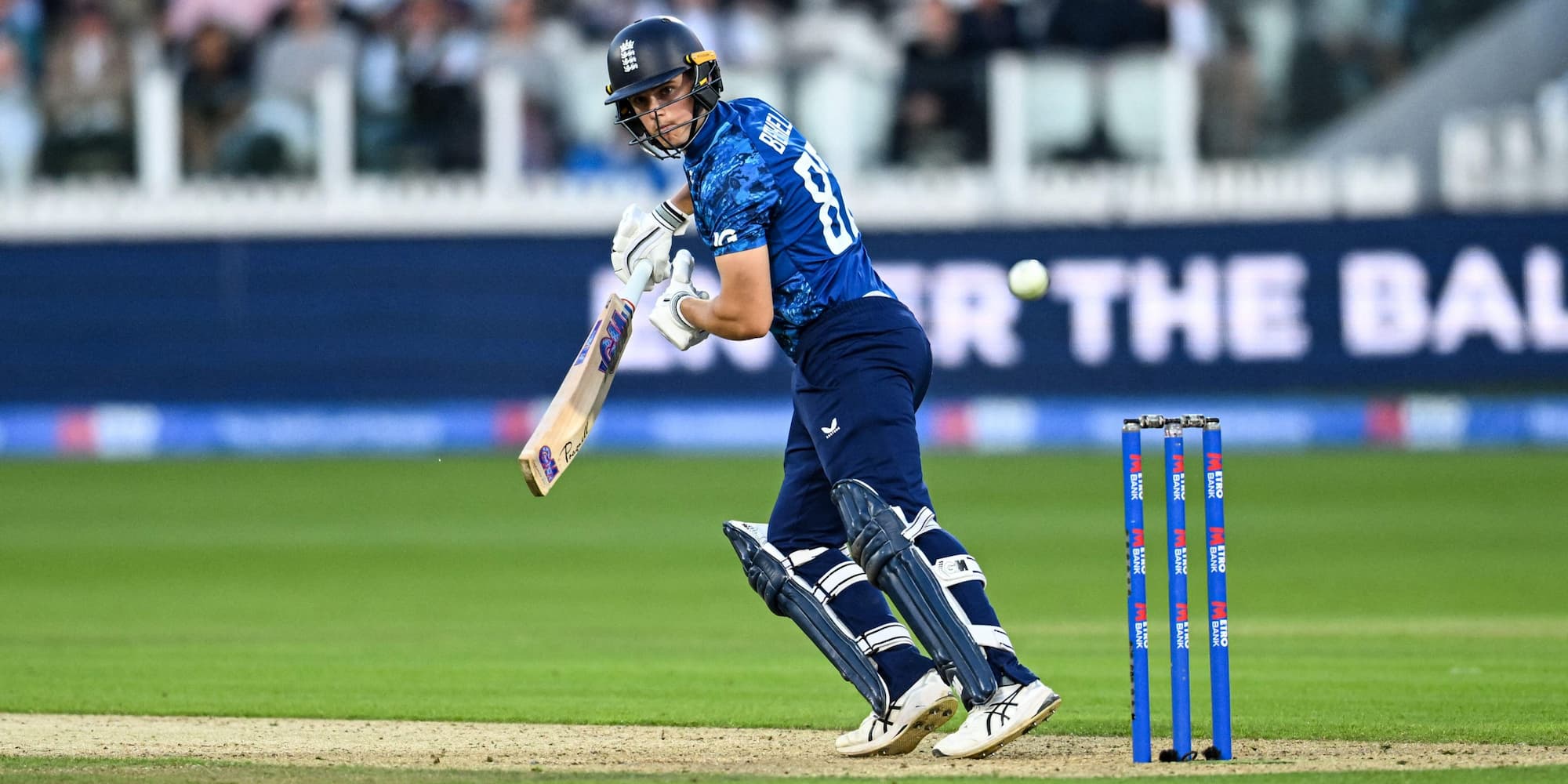 Jacob Bethell batting for England in their blue strip