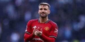 Luke Shaw playing for Manchester United playing in their red home strip