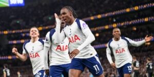 Tottenham players celebrate scoring a goal