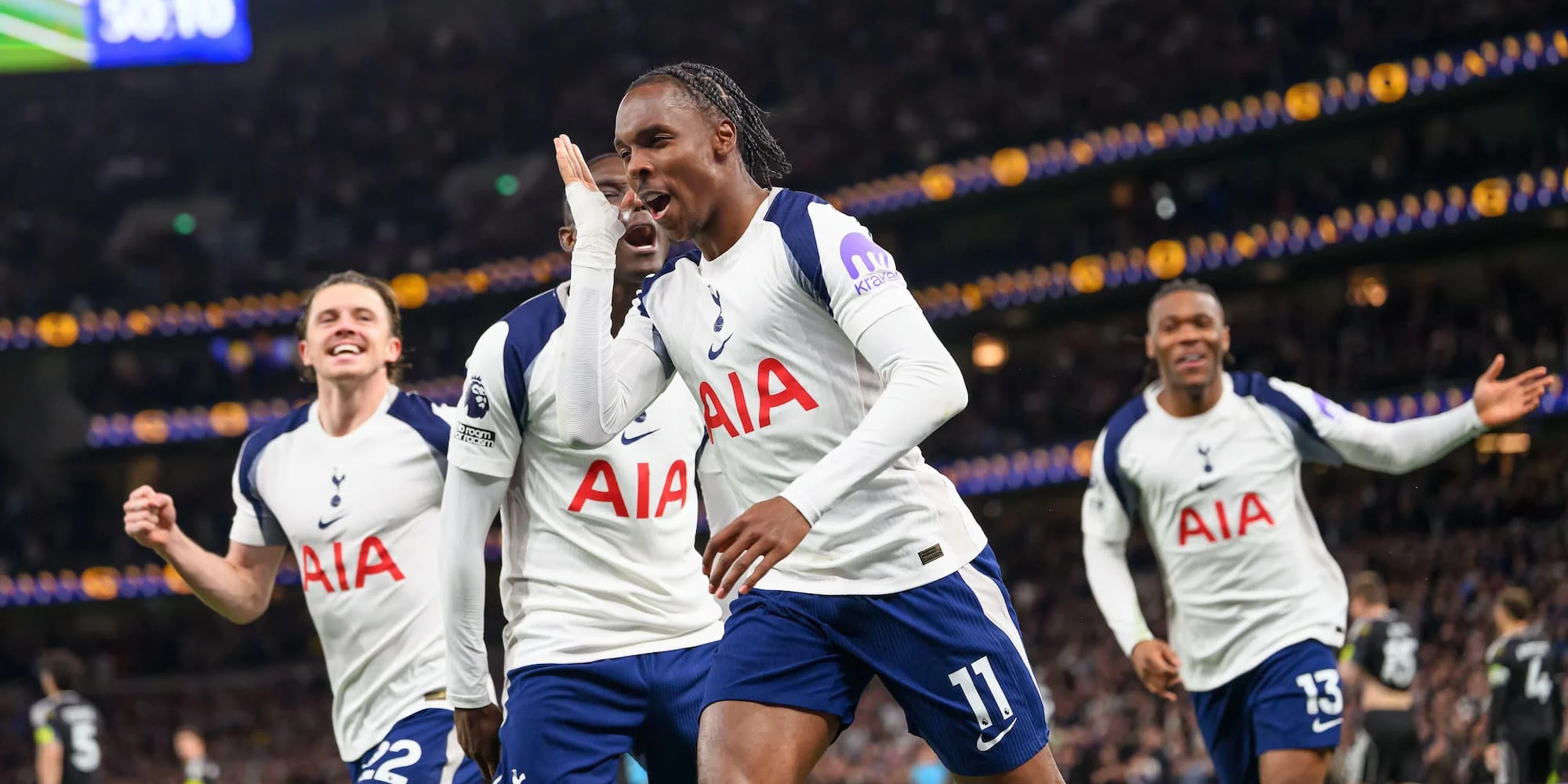 Tottenham players celebrate scoring a goal