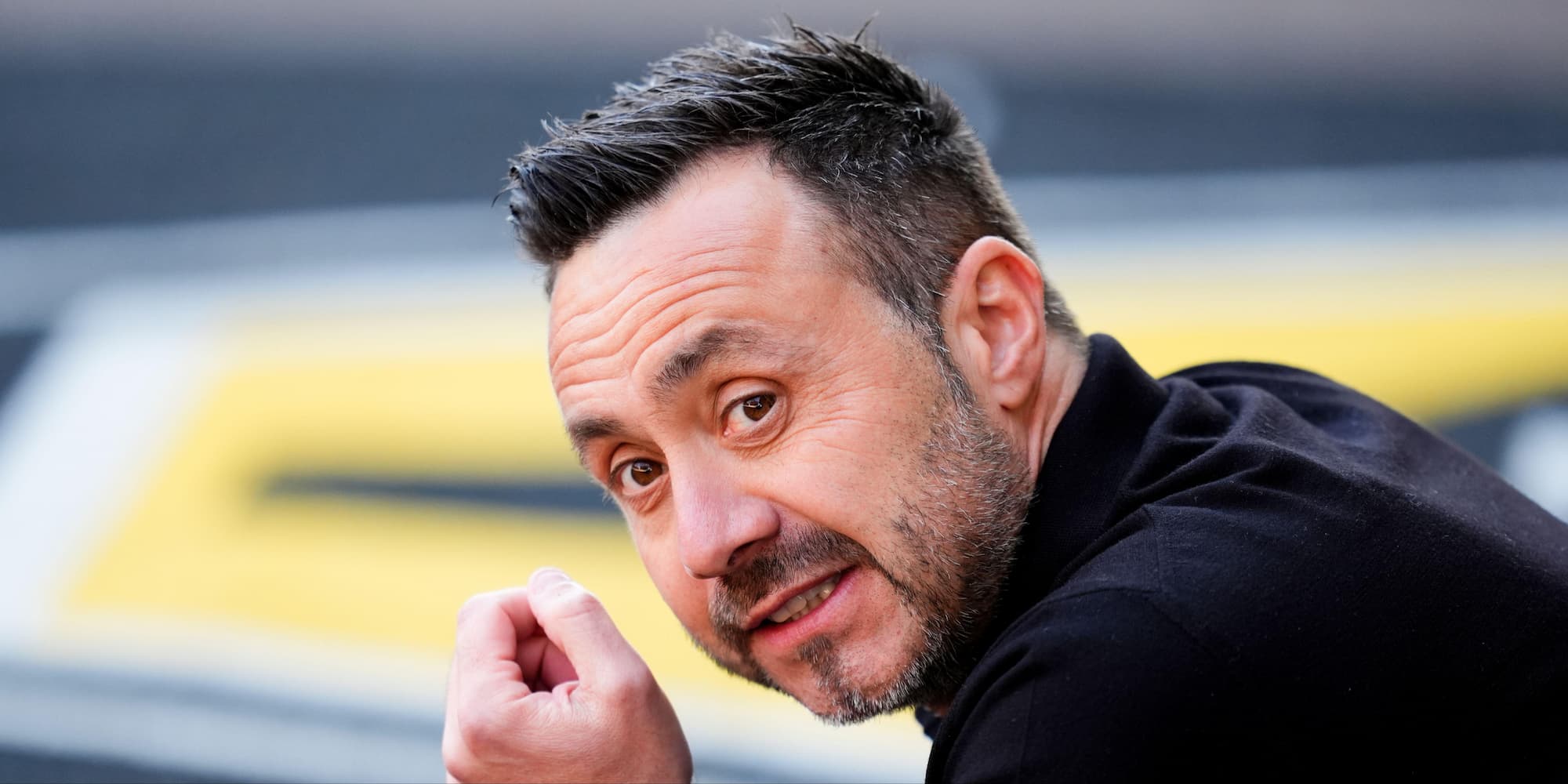 Roberto De Zerbi looking pensive on the sidelines as Tottenham manager