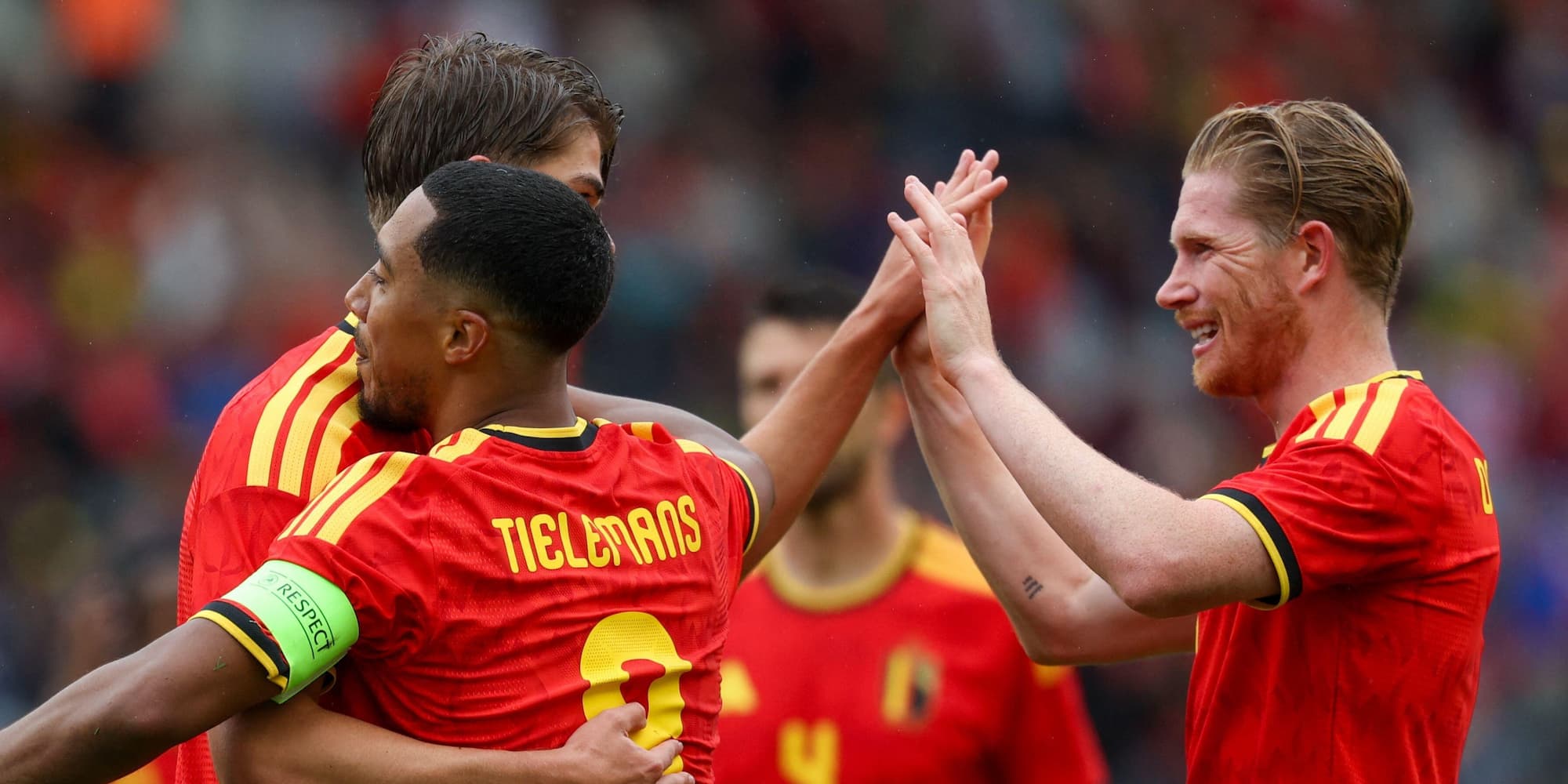 Youri Tielemans and Kevin De Bruyne celebrate scoring a goal for Belgium