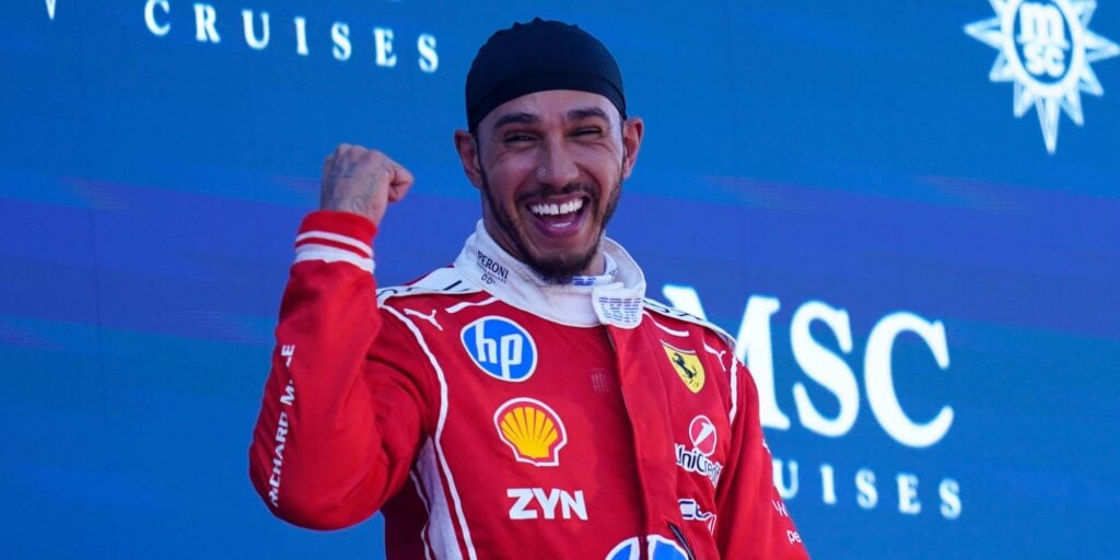 Lewis Hamilton on the podium celebrating his first win for Ferrari in Barcelona