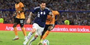 Lionel Messi dribbling the ball while playing for Argentina