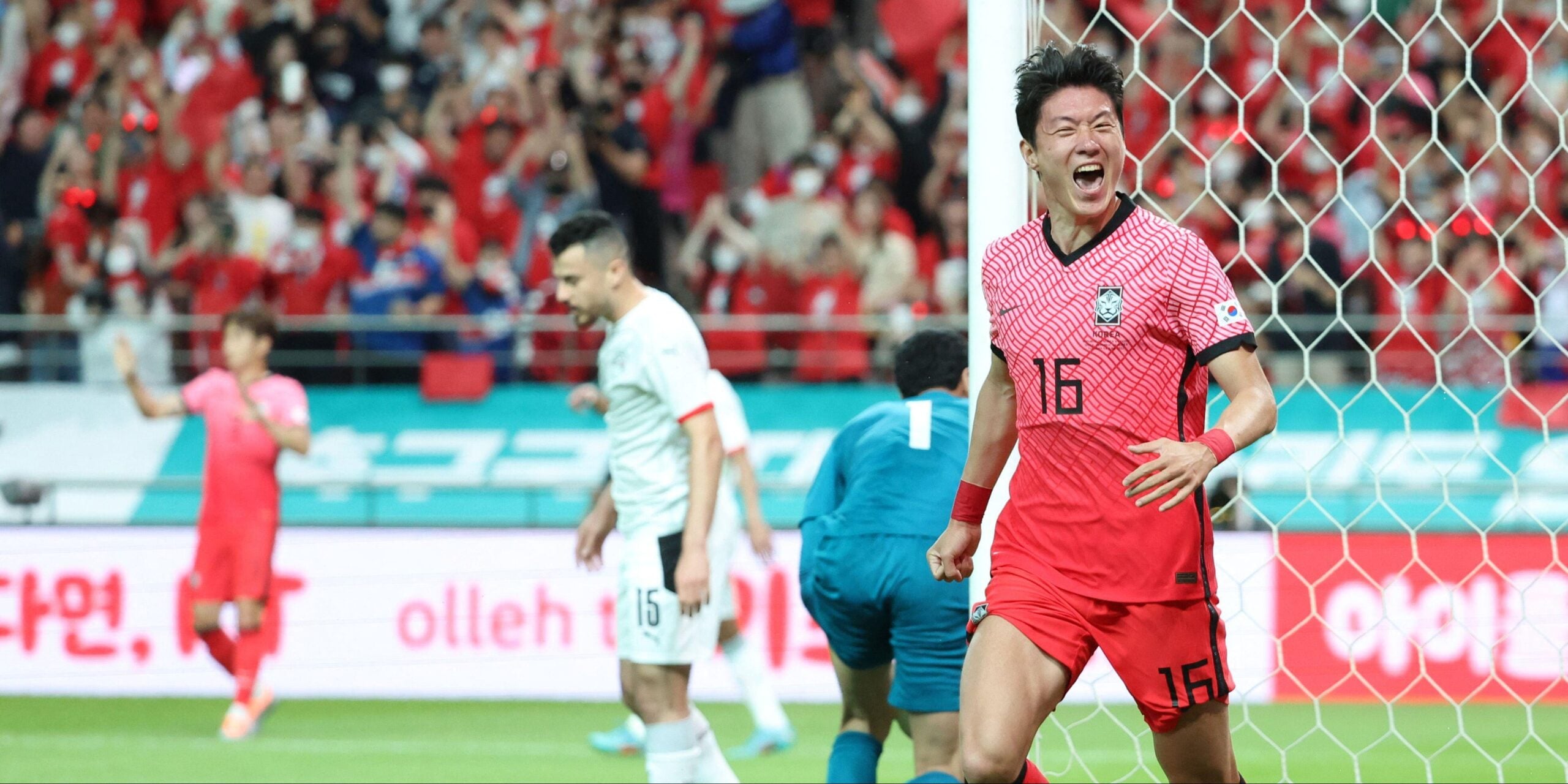 South Korea players celebrate scoring a goal