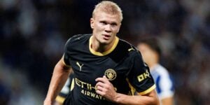 Erling Haaland scoring a goal for Manchester city in the Champions League