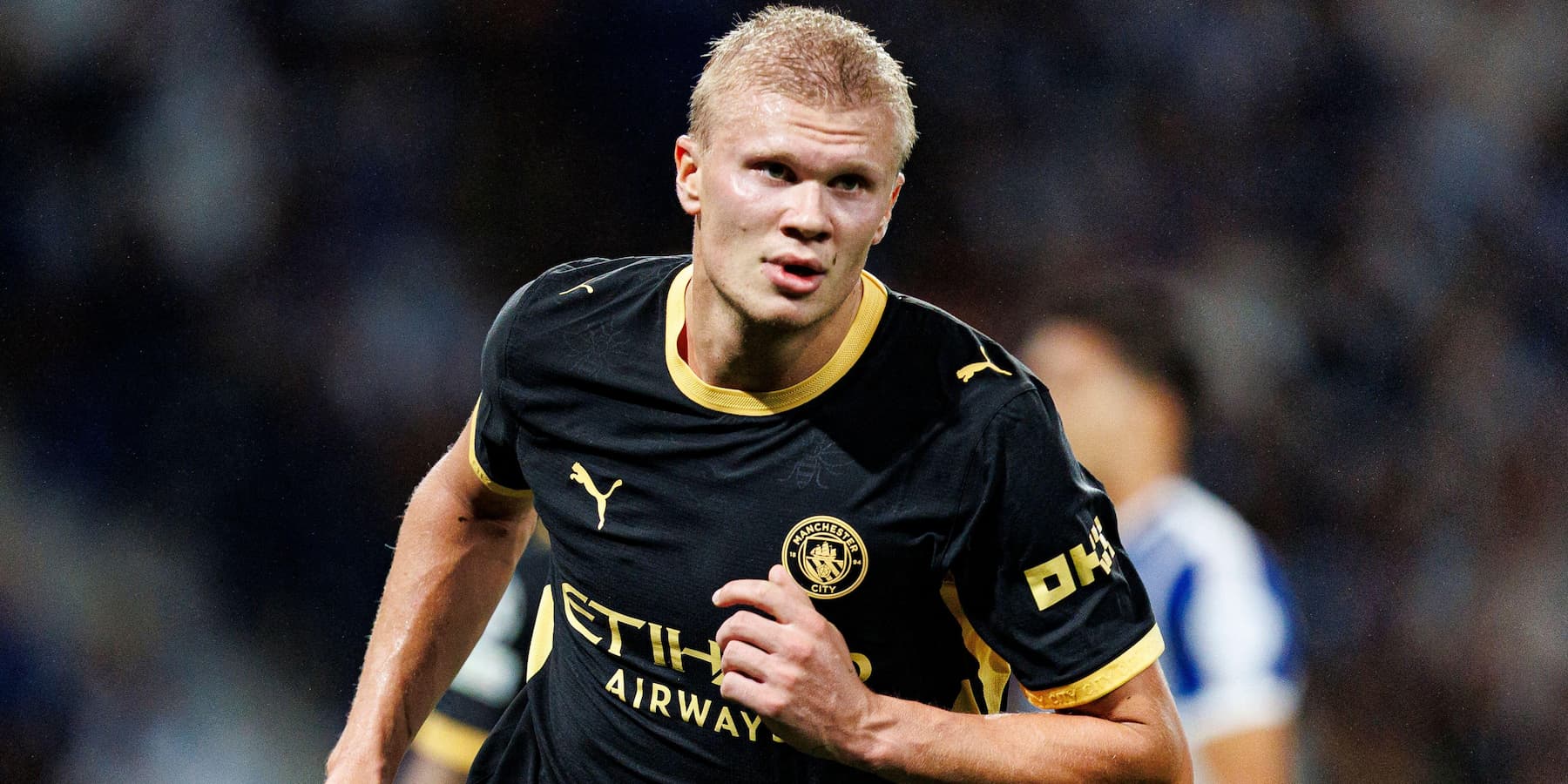 Erling Haaland scoring a goal for Manchester city in the Champions League